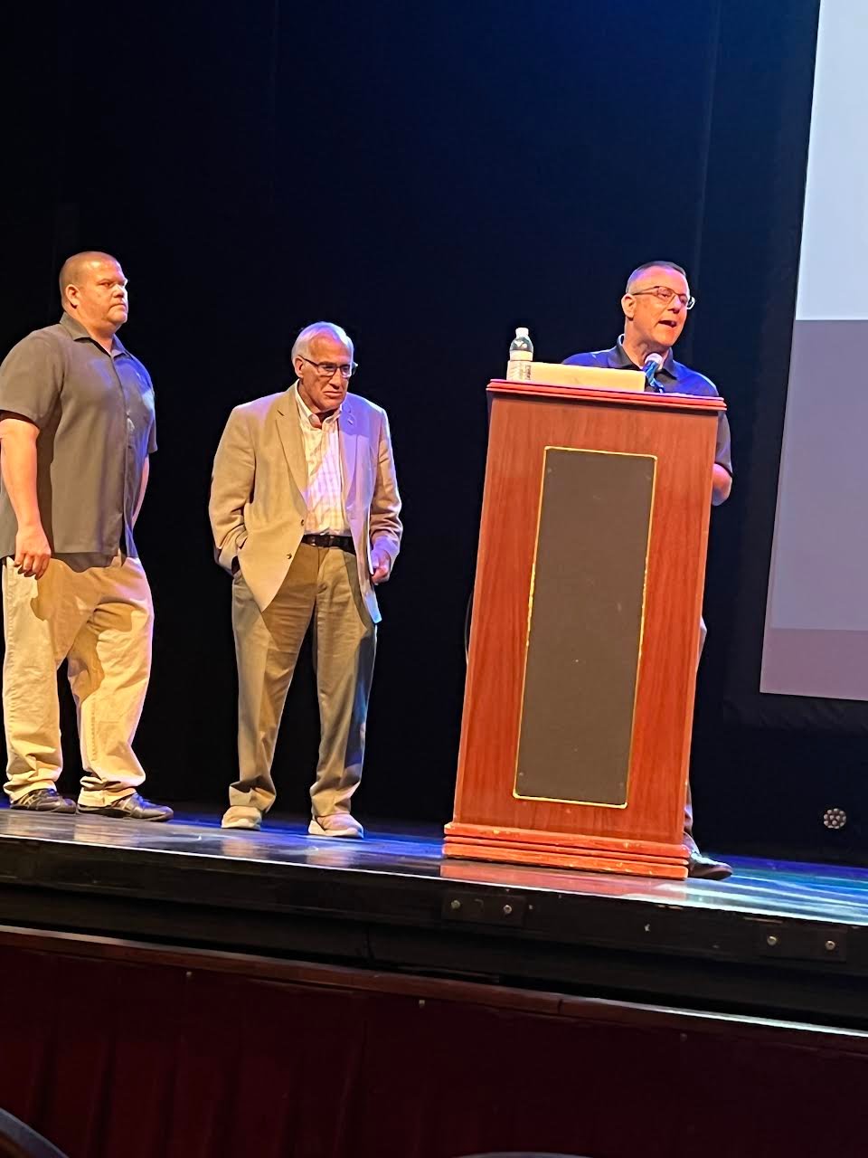 (Left to right) Timothy N. Nordberg, senior project engineer of Wastewater at H2M architects + engineers, stands alongside Patchogue Village mayor Paul Pontieri and Legis. Dominick Thorne while speaking to the audience about their support for the new sewer project in the village.